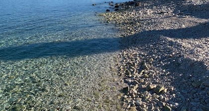 Beachfront holiday retreat with pristine sea views that blend comfort and nature