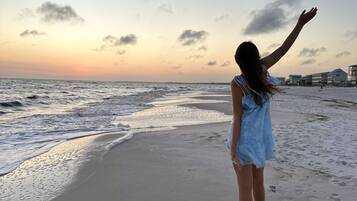 On the beach, sun-loungers, beach towels