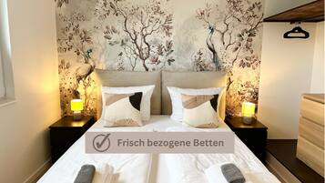 1 slaapkamer, een strijkplank/strijkijzer, gratis wifi, beddengoed