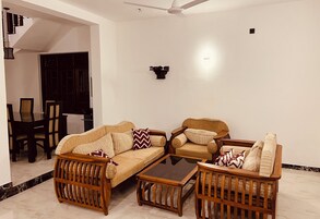 Habitación estándar, 1 cama de matrimonio | Zona de estar