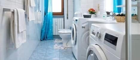 Comfort Room | Bathroom | Designer toiletries, hair dryer, soap, shampoo
