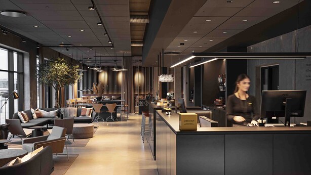 Un intérieur moderne avec un bar, des sièges et une grande fenêtre offrant une vue panoramique.