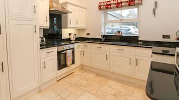 Fridge, electric kettle, toaster, cookware/dishes/utensils