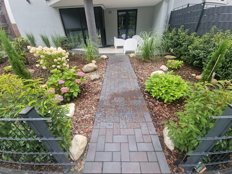 Property grounds. 2-room apartment on the ground floor with terrace and space for up to 4 guests