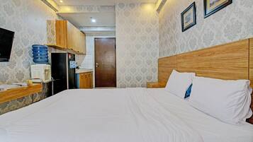 Deluxe dubbelrum | Skrivbord och sängkläder