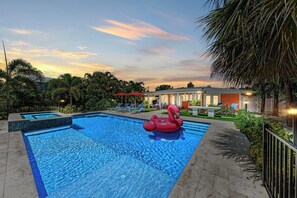 A heated pool - Fancy Flamingo: Canal Front, Dock, Heated Pool & Spa by Anna Maria Life Vacation Rentals (Anna Maria)