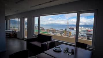 Business Apartment, 1 King Bed with Sofa bed | Living area | Flat-screen TV