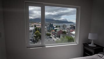 2 bedrooms, blackout curtains, soundproofing, iron/ironing board