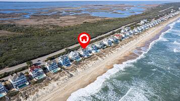 On the beach, sun loungers, beach towels