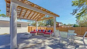 Outdoor dining - Pensacola Backyard Oasis 
January 2026 Pool Renovation (Gulf Breeze)