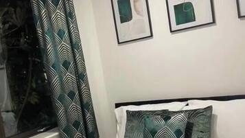 2 bedrooms, iron/ironing board, travel cot, WiFi