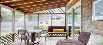 Inviting, two-story home with a large yard, sunroom, balcony, & washer/dryer