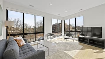 Premium Apartment, 2 Bedrooms | Living area | 55-inch Smart TV with digital channels, Netflix, Hulu