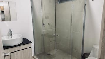 Shower, towels, toilet paper