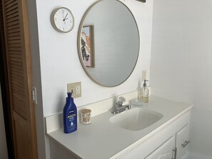 Hair dryer, towels, soap, shampoo