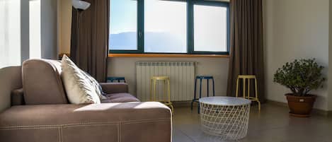 Romantic Apartment, Mountain View | Living area | TV