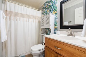 Hair dryer, towels, soap, shampoo