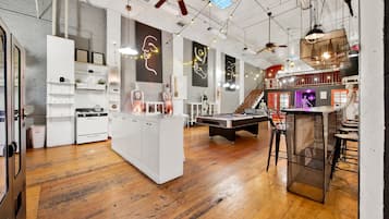 Design Loft | Living area | 50-inch Smart TV with digital channels, streaming services