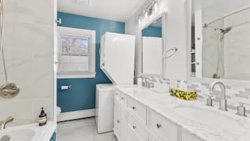 Hair dryer, towels, soap, shampoo