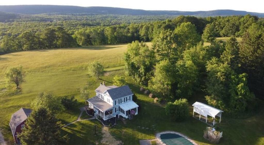 Scenic farmhouse: 100 acres