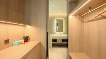 1 King Suite | Premium bedding, down comforters, laptop workspace, blackout drapes