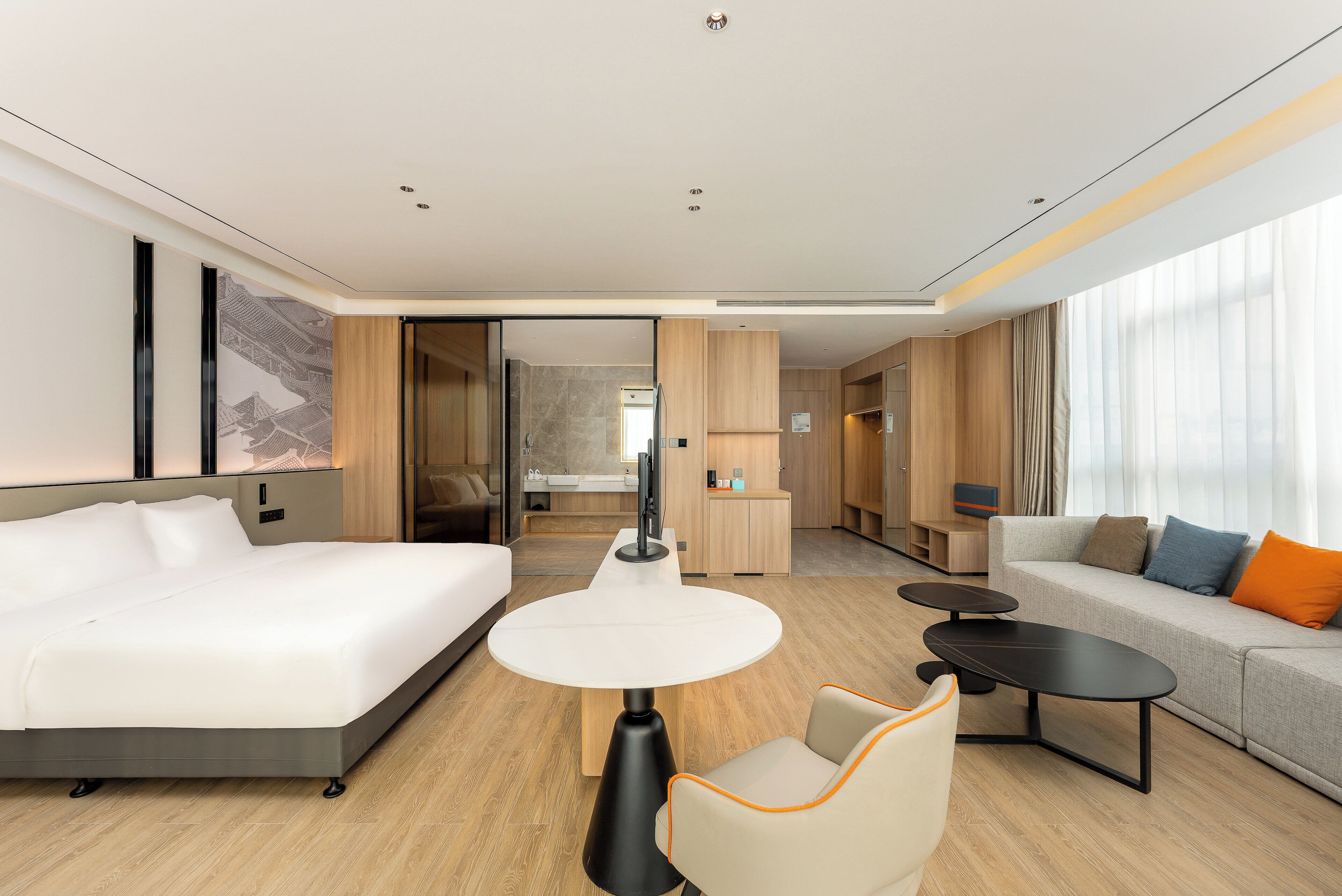 1 King Suite with Daybed | Premium bedding, down comforters, laptop workspace, blackout drapes