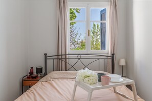 1 chambre, fer et planche à repasser, Wi-Fi gratuit, draps fournis