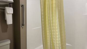 Combined shower/bathtub, rainfall showerhead, towels, soap
