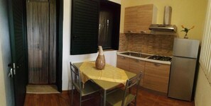 Fridge, stovetop, cookware/dishes/utensils