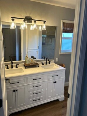 Regadera y secadora de cabello 