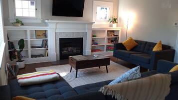 Smart TV, fireplace, books