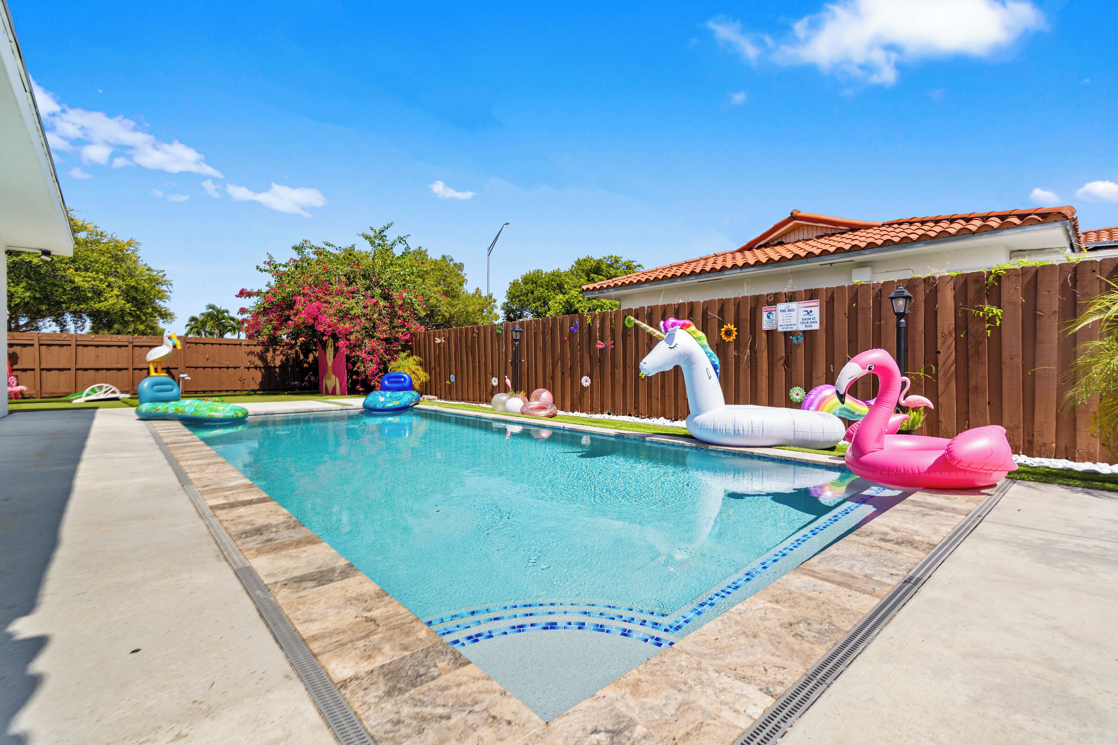 Enjoy our heated pool with spa jets, lounge chairs, and shaded seating to unwind