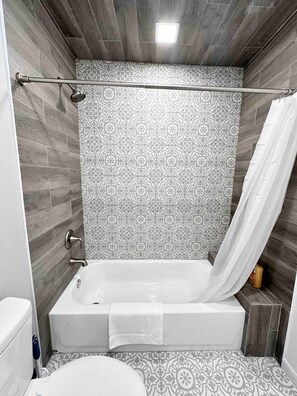 Hair dryer, towels, soap, shampoo