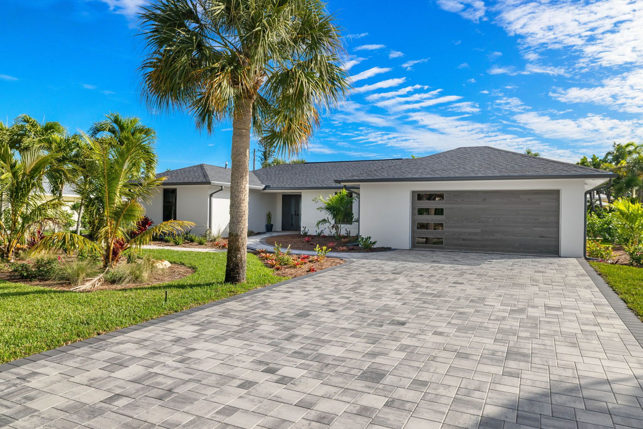 Nestled along a pristine canal with long range views, this meticulously crafted residence defines coastal luxury at its finest.NEW!