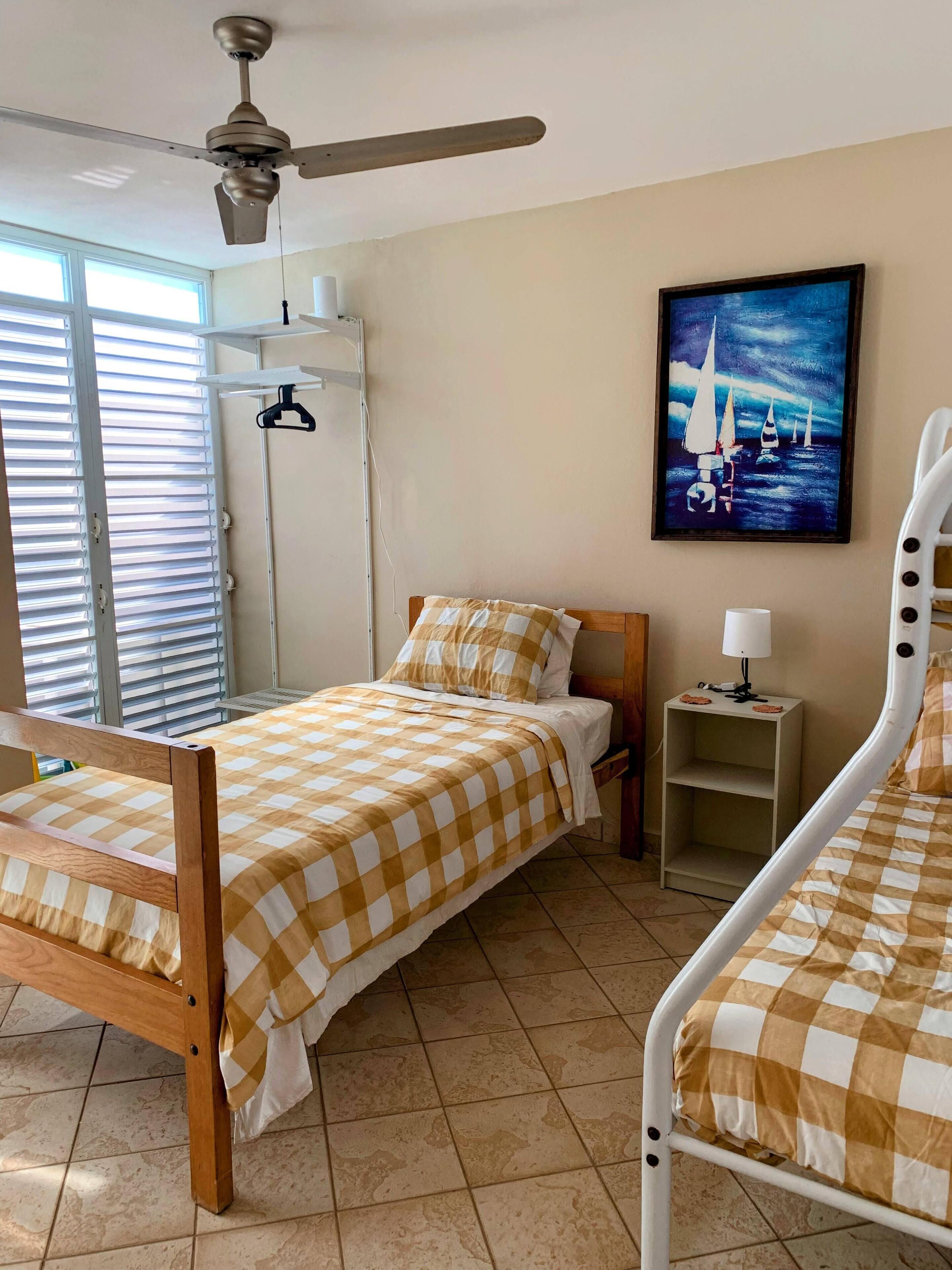 3 bedrooms, desk, iron/ironing board, travel cot