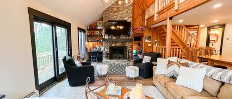 Télévision, cheminée, table de tennis de table, chaîne hi-fi