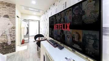 Habitació doble Deluxe | Roba de llit d'alta qualitat, minibar gratuït i decoració individual