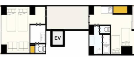 A hotel layout with multiple rooms, a central hallway, and an EV charging station.