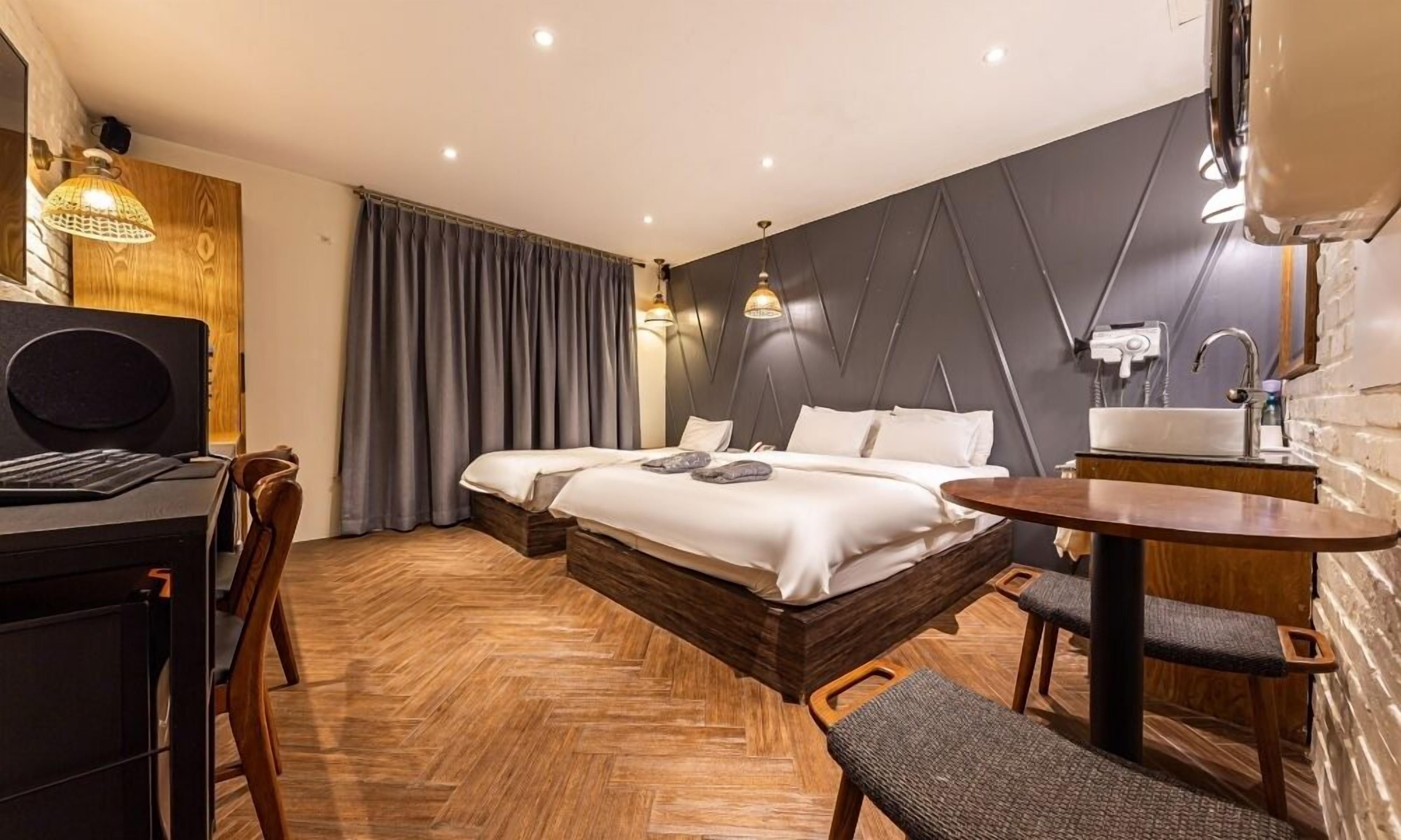 Chambre Économique avec lits jumeaux | Décoration personnalisée, ameublement personnalisé, Wi-Fi gratuit