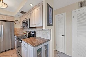 Cook meals in the comfort of the condo.  Pots, pans, dishes are included.  No oils or food items. - Gulf, Beach, Pool View Balcony on Venice Beach (Venice)