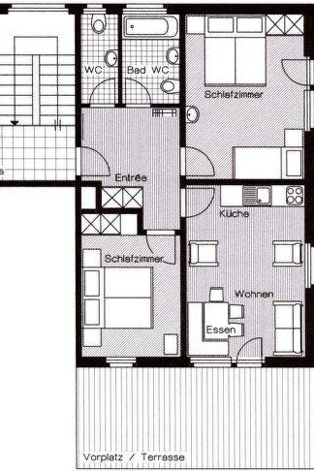 A floor plan with a living room, kitchen, two bedrooms, a bathroom, and an entrance.