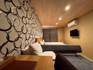 Habitació quàdruple | Escriptori i espai de treball apte per a portàtils