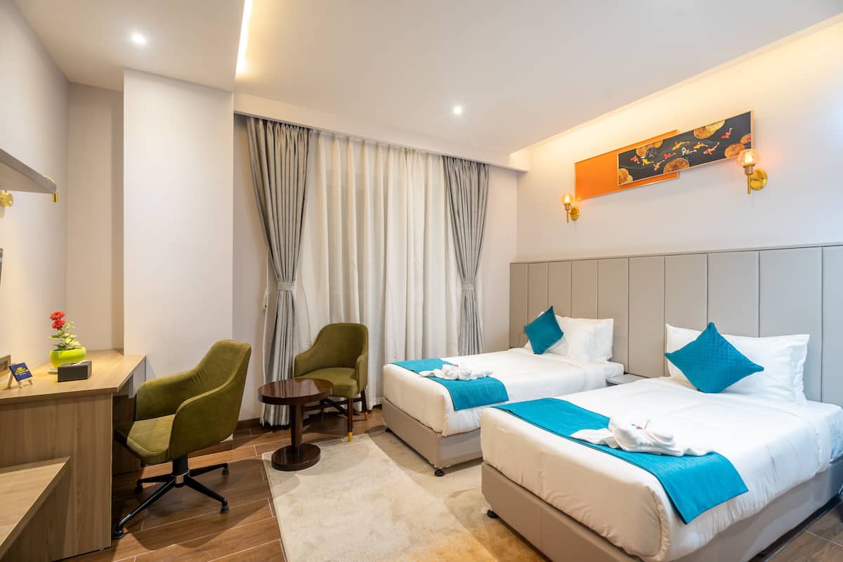 2 habitaciones, ropa de cama hipoalergénica y minibar