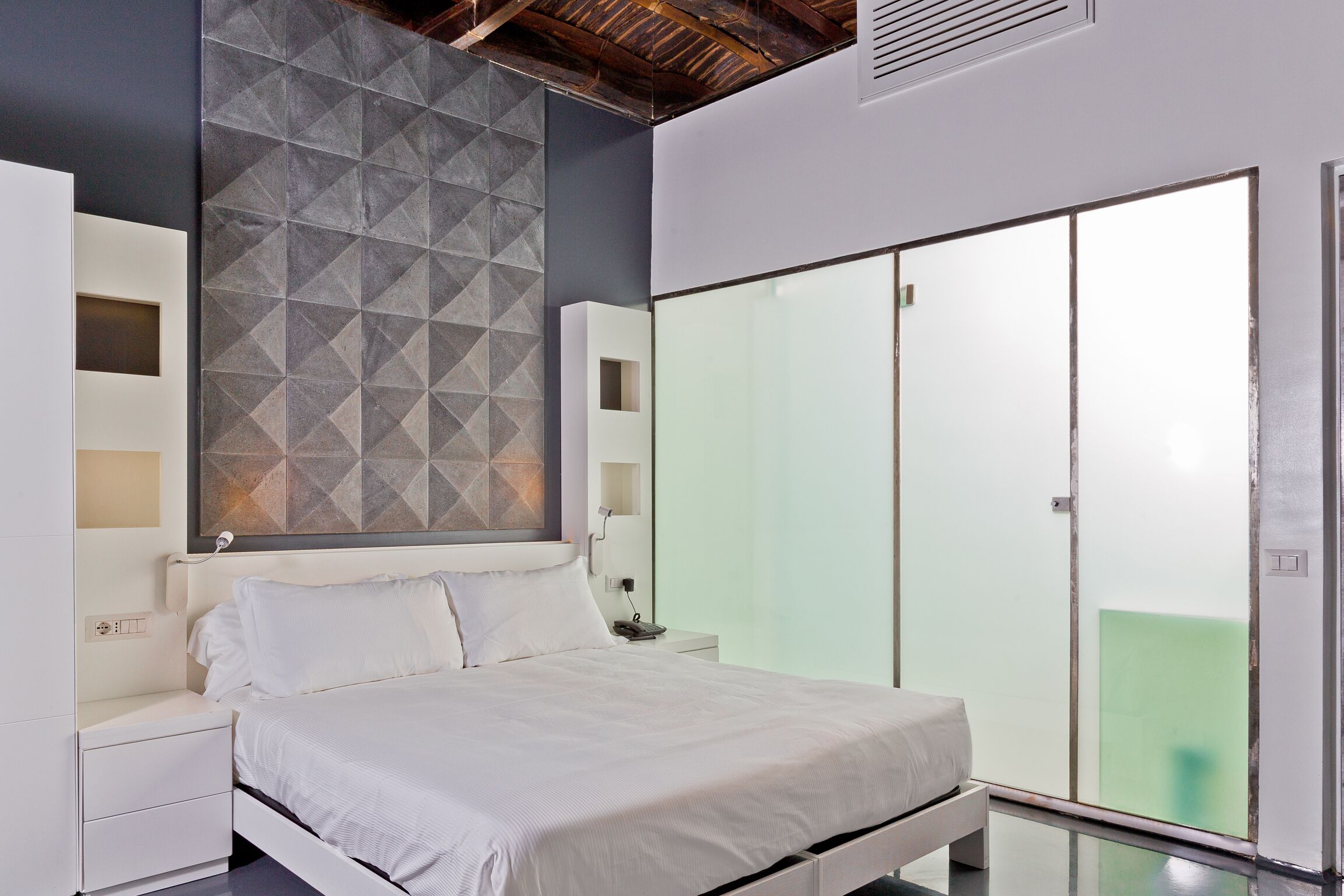 Habitación Deluxe | Caja de seguridad en la habitación, cortinas blackout y insonorización 