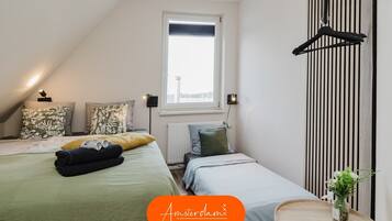 3 bedrooms, in-room safe, iron/ironing board, travel crib