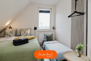 3 bedrooms, in-room safe, iron/ironing board, travel cot