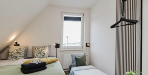 3 bedrooms, in-room safe, iron/ironing board, travel cot