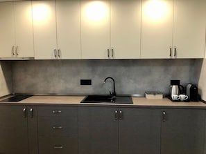 Fridge, coffee/tea maker, cookware/dishes/utensils