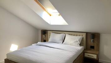 1 slaapkamer, een strijkplank/strijkijzer, wifi, beddengoed