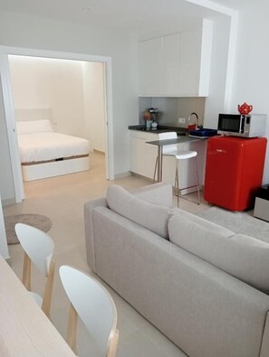 Basic Apartment | Living area | 42-inch Smart TV with cable channels, heated floors